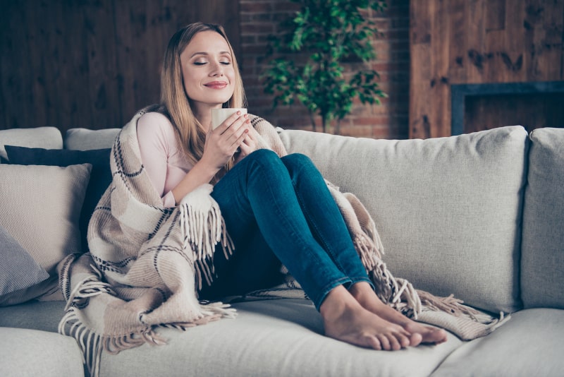 Happy woman on couch