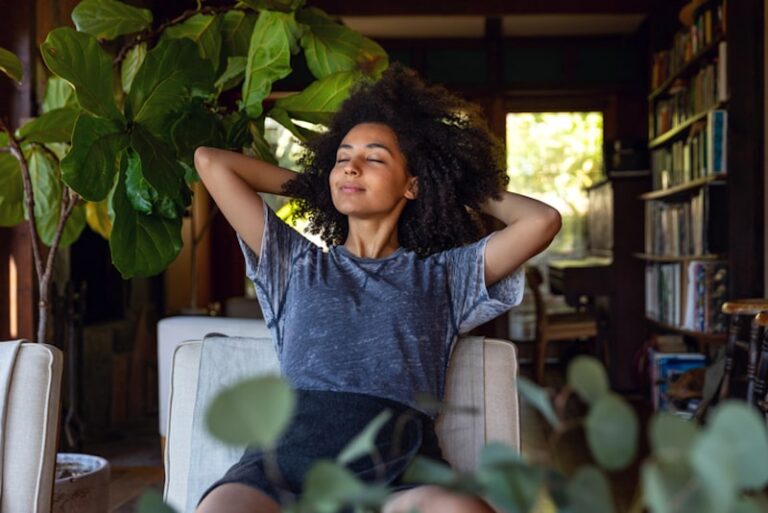 woman relaxing in home filled with plants