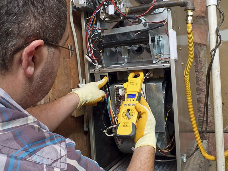 tech maintaining furnace